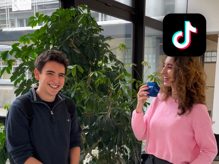A student interviews a student
